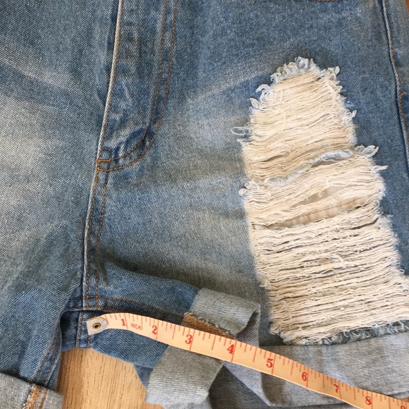 Distressed denim shorts - Picture 4 of 8